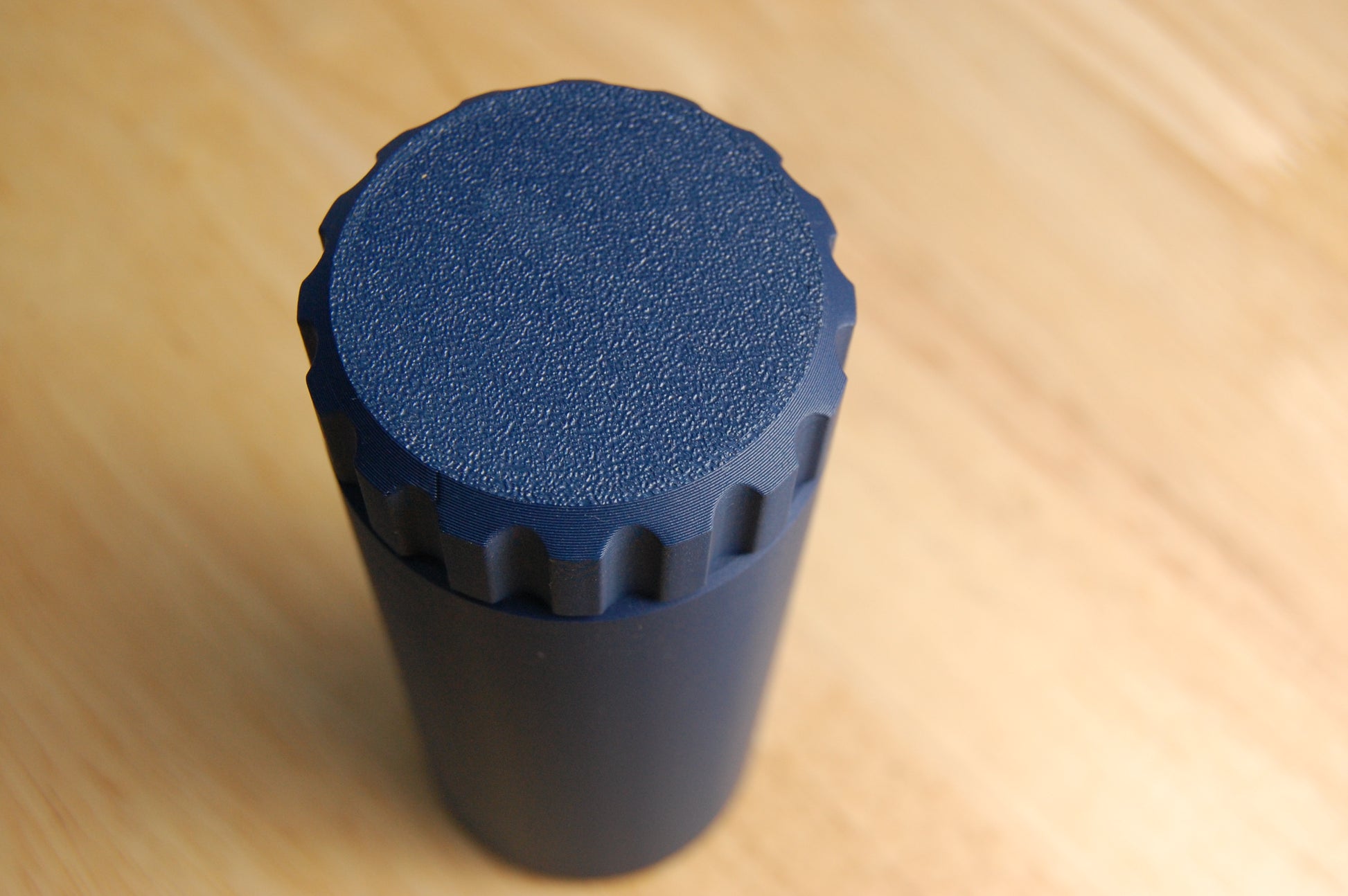 Close navy blue suborbital capsule razor travel case