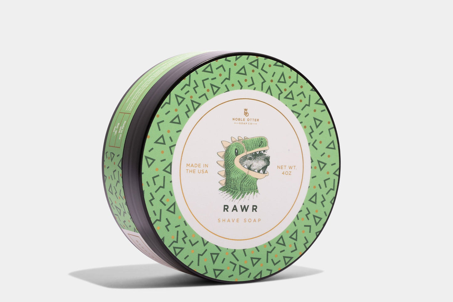 Noble Otter Shave Soap "RAWR" with a white and green decorative label on a white background.