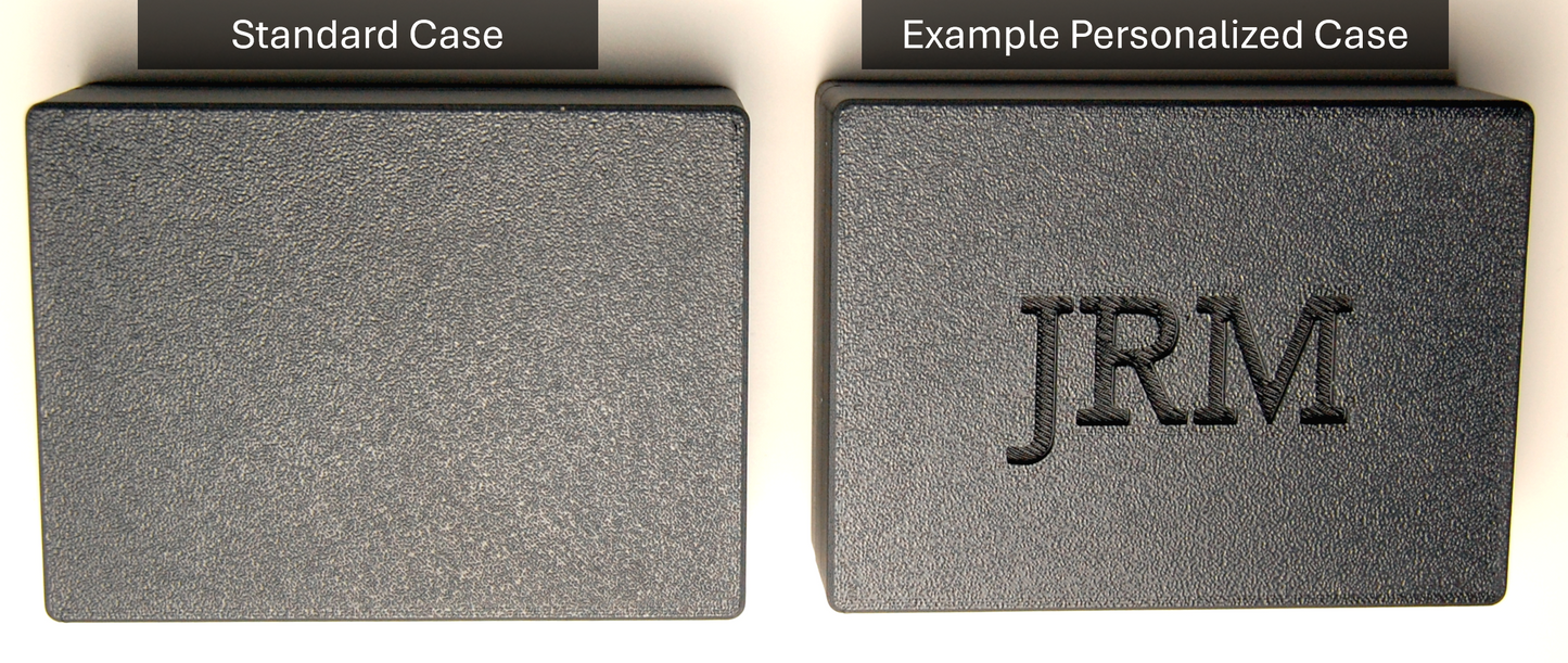 Example standard and personalized Rockwell Razor Travel Cases. Standard case is on the left, personalized case is on the right with the letters "JRM" showcased on the lid. Cases are sitting on a white back ground with the text "Standard Case" above the left razor travel case and "Example Personalized Case" above the right razor travel case case.