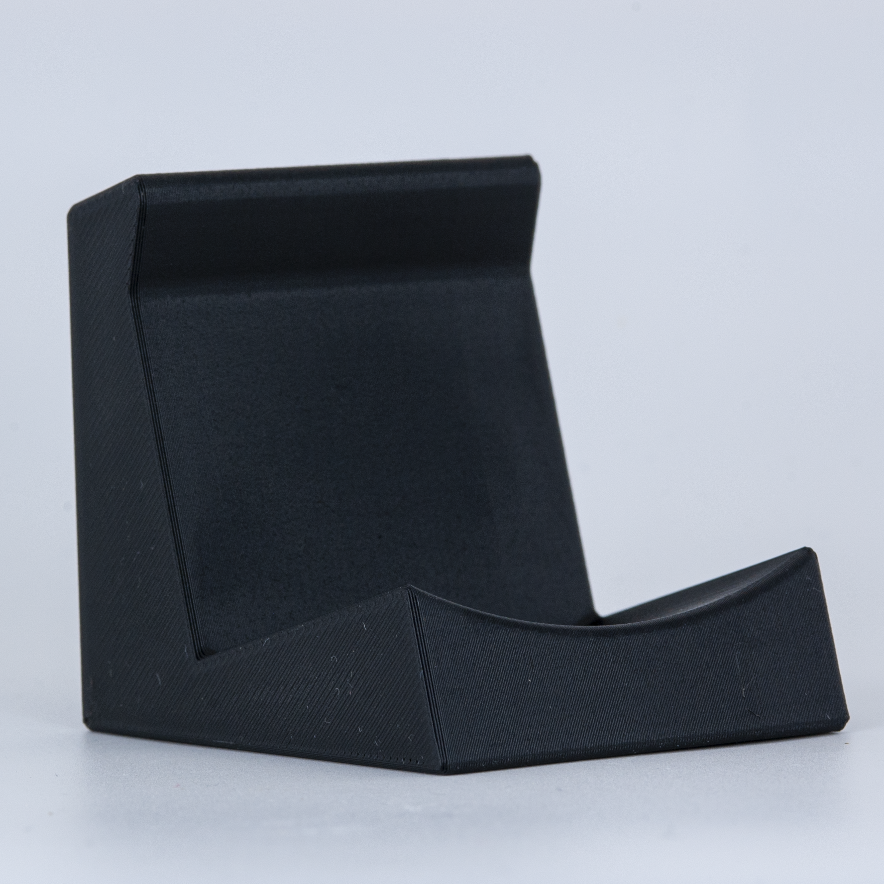 Closeup detailed view of a black shave of the day soap stand