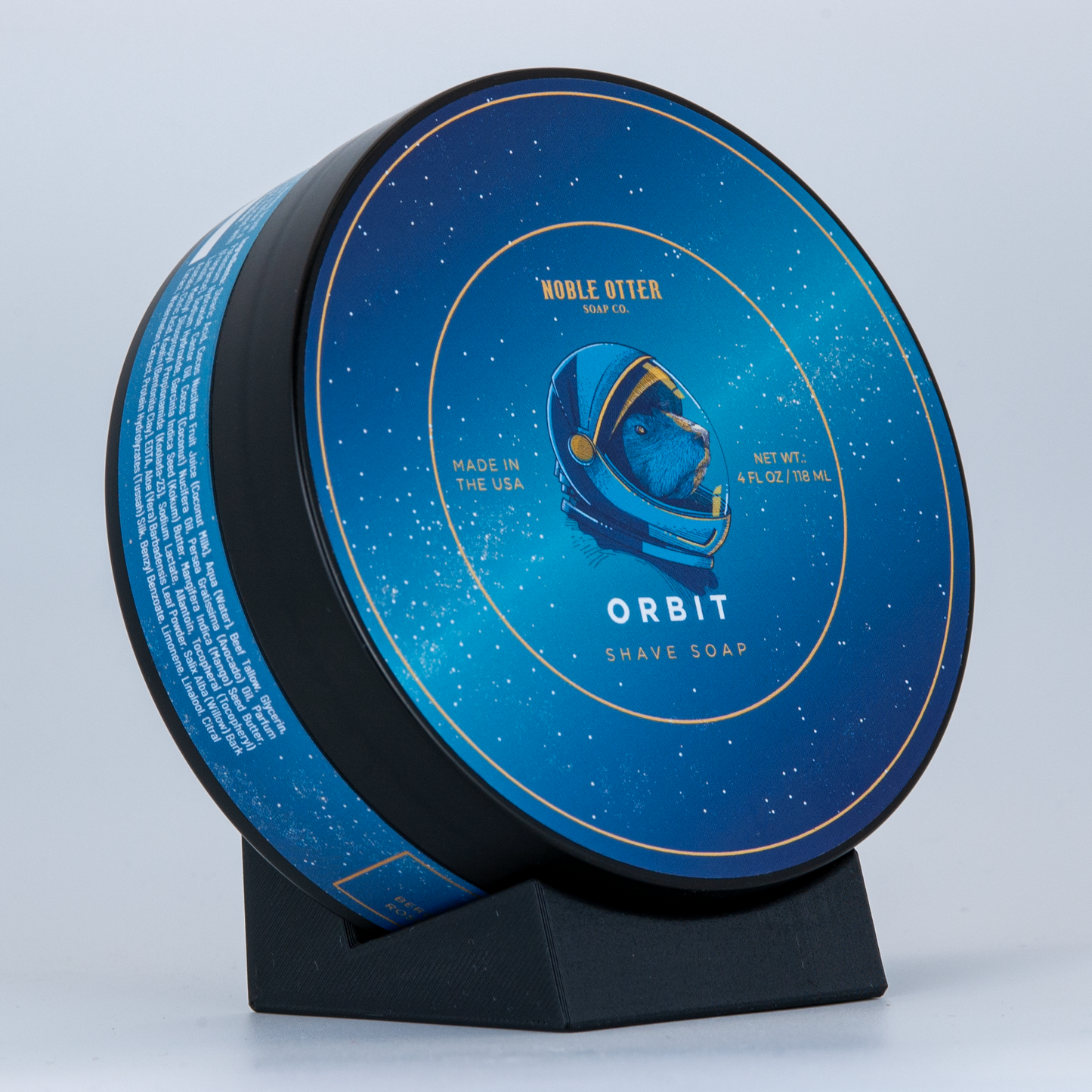 Black SOTD soap stand with Noble Otter Orbit shave soap.