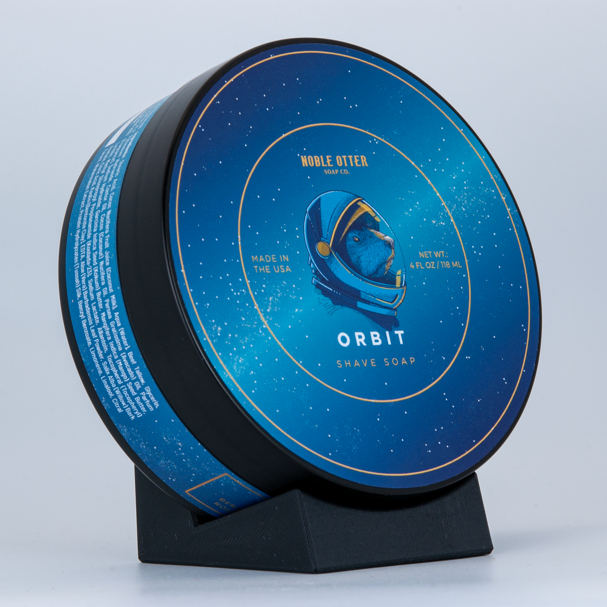 Black SOTD soap stand with Noble Otter Orbit shave soap.