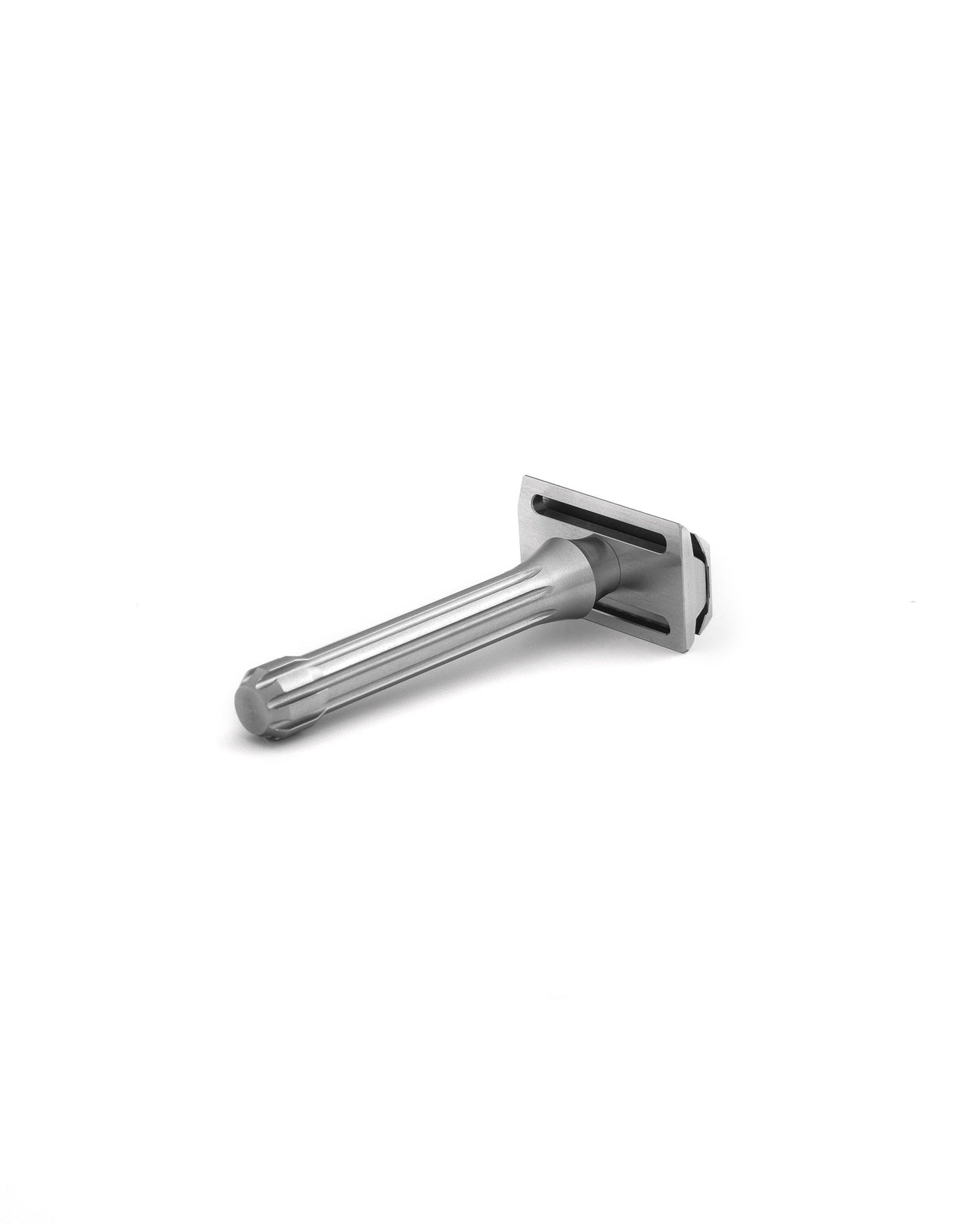 Blackbird double-edge safety razor in matte silver stainless steel with fluted handle, shown at an angle on white background