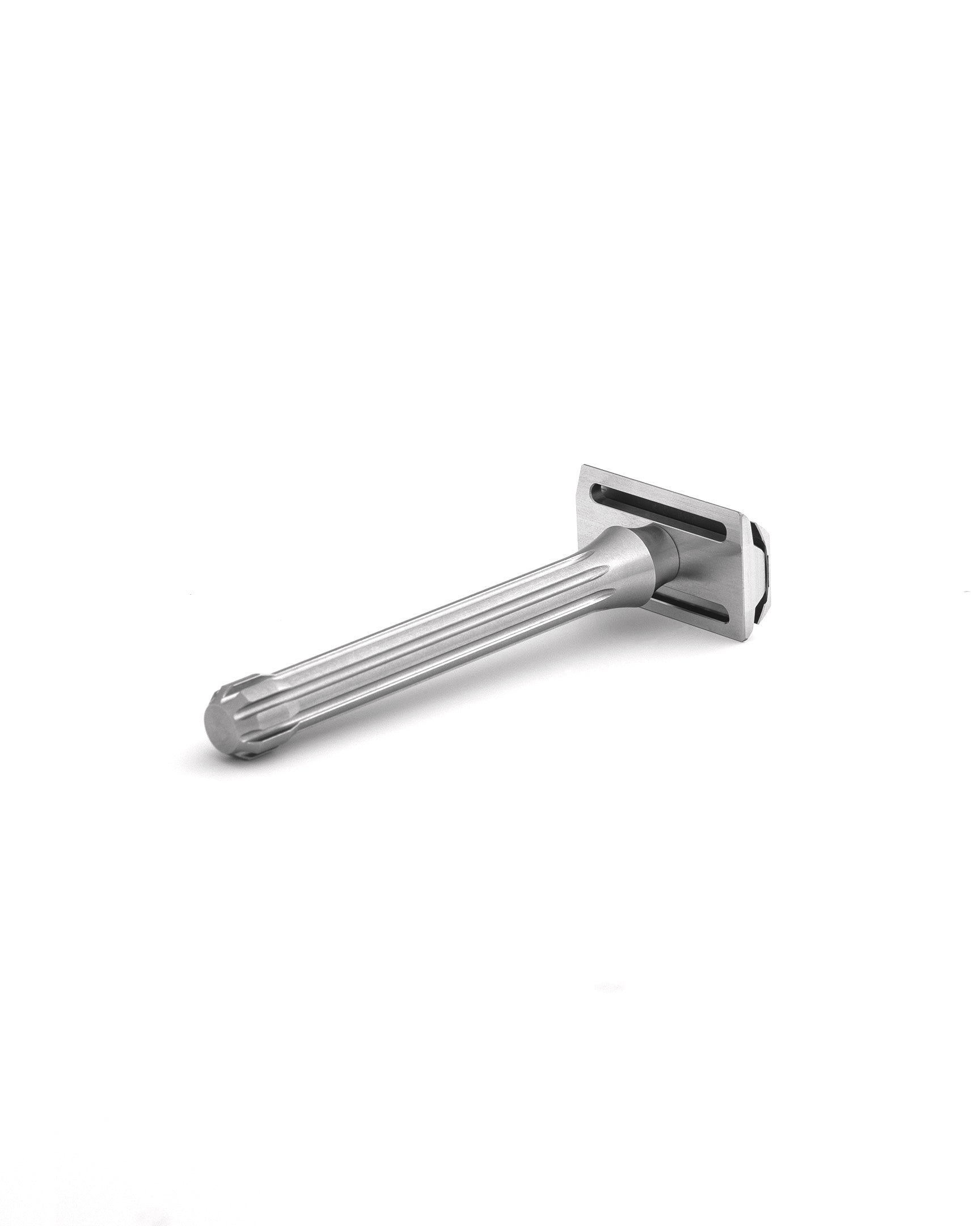 Blackbird double-edge safety razor in brushed stainless steel with fluted handle, shown at an angle on white background