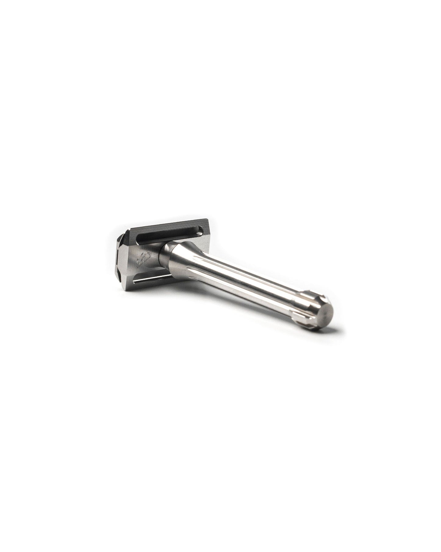 Blackbird safety razor in polished stainless steel with angular geometric head and smooth cylindrical handle