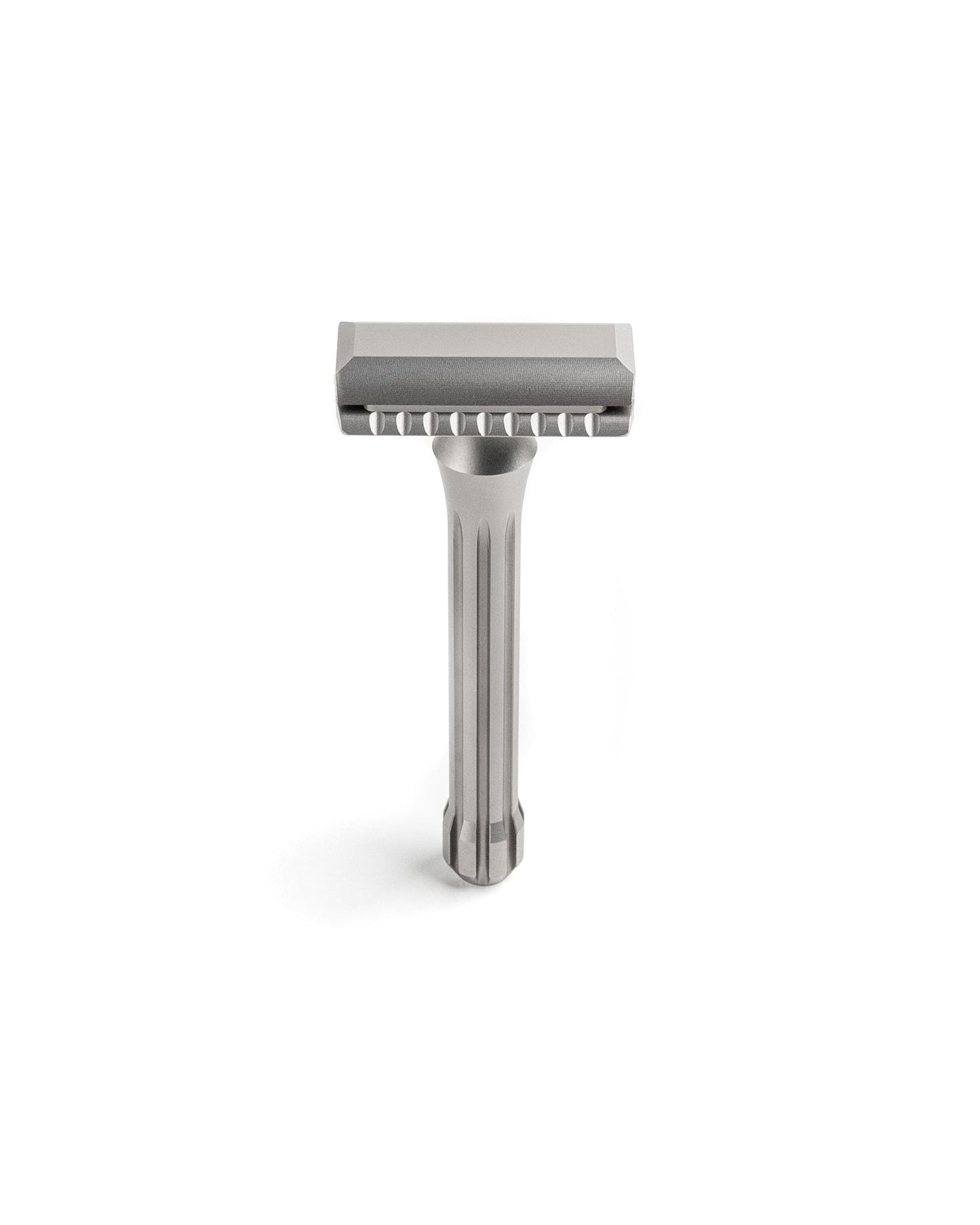 Blackbird Titanium double-edge safety razor with matte silver finish, fluted handle, and scalloped open-comb head