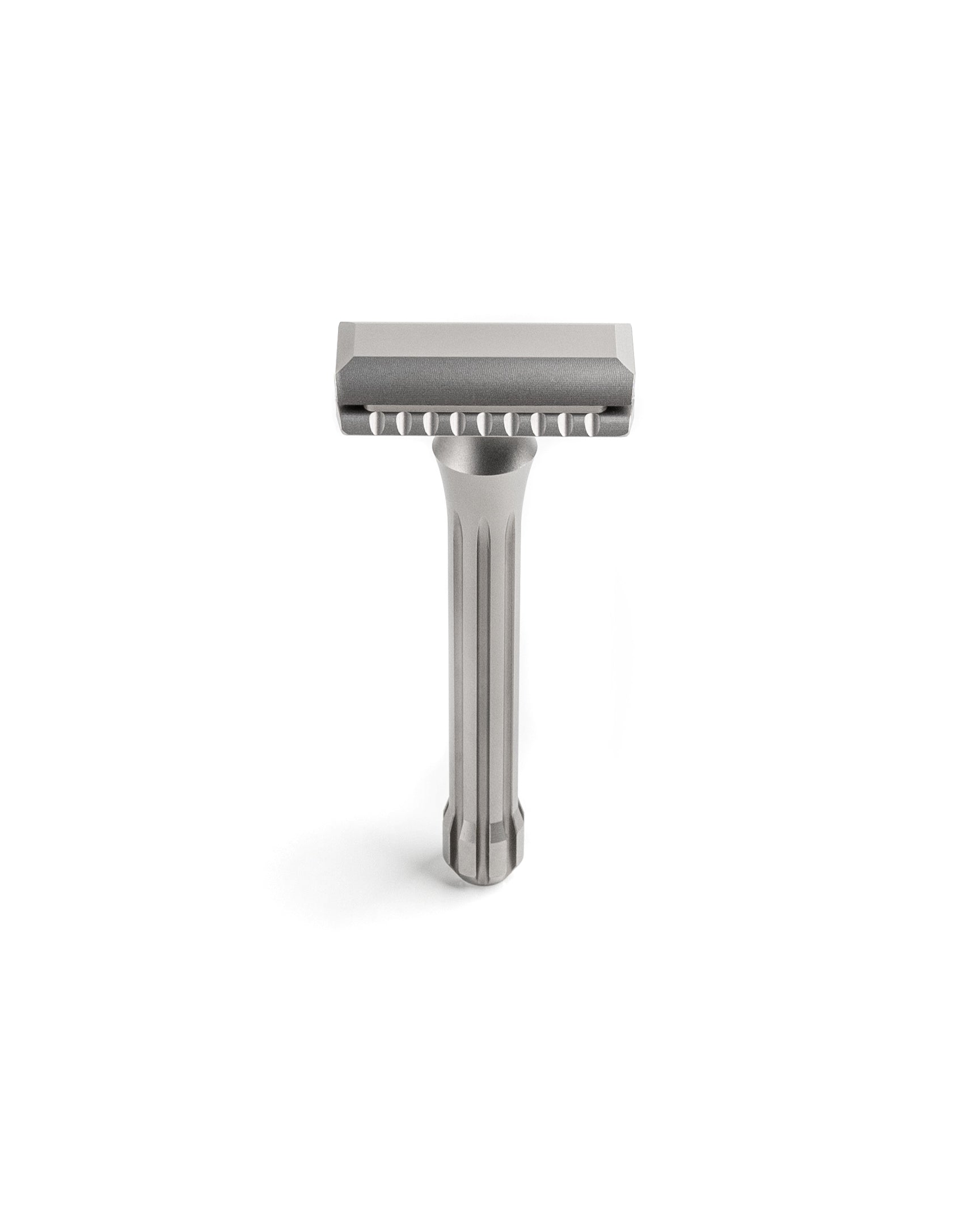 Blackbird Titanium double-edge safety razor with matte silver finish, fluted handle, and scalloped open-comb head
