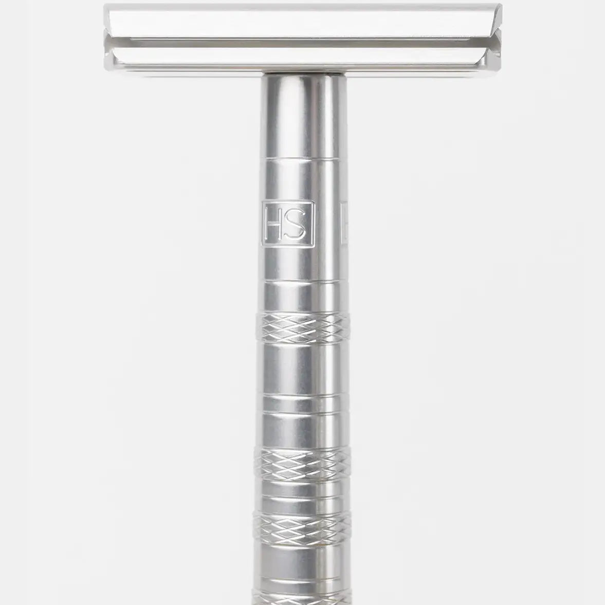Silver aluminum Henson AL13 double-edge safety razor with knurled grip handle and engraved HS logo, close-up view