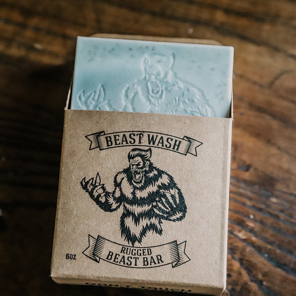 Beast Wash Rugged Beast Bar 6oz blue soap with bigfoot embossed design in kraft cardboard box with yeti illustration