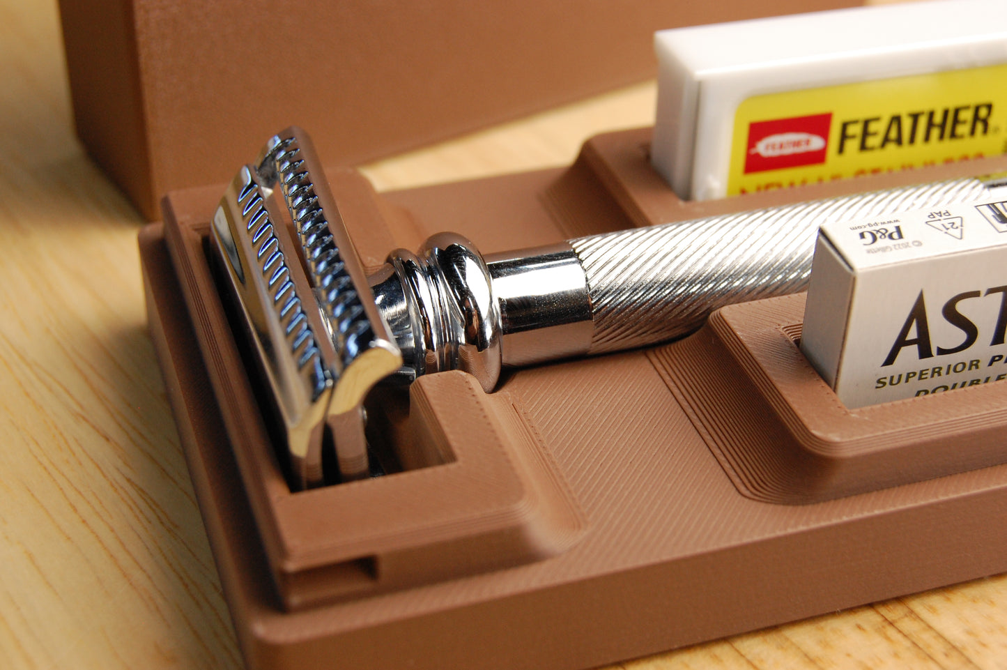 Merkur 39C close up in a chocolate brown case