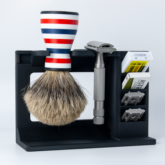Mission control shaving stand with a rockwell 6s razor and custom red white and blue shaving brush on a white background. 