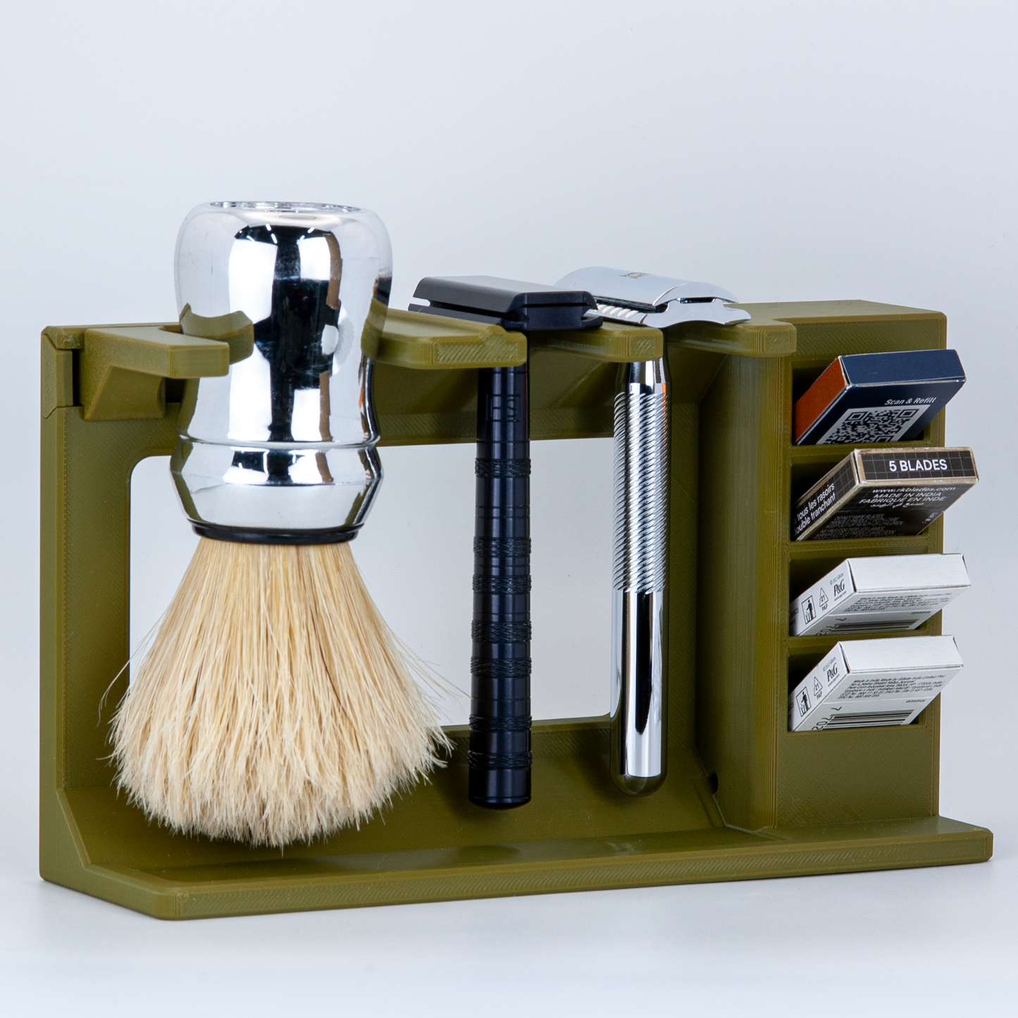 Two razor army green mission control stand with omega brush, red oliworks razor and king c gillette