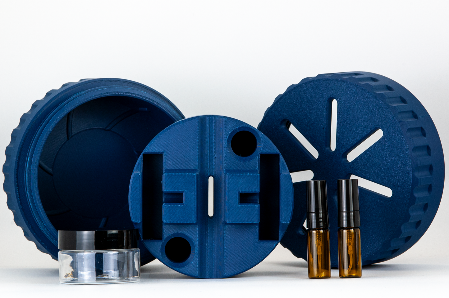 Full navy blue razor UFO capsule on a white background.  