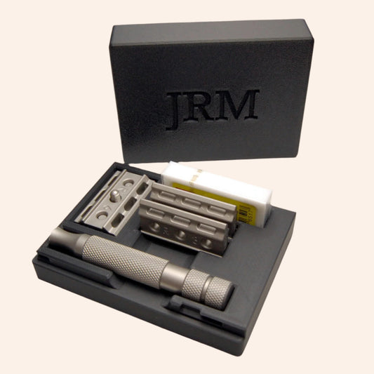 Sophisticated personalized black Rockwell 6C/6S razor case on a white background.  The letters "JRM" are  on the case lid.  The razor and spare blades are in the case.