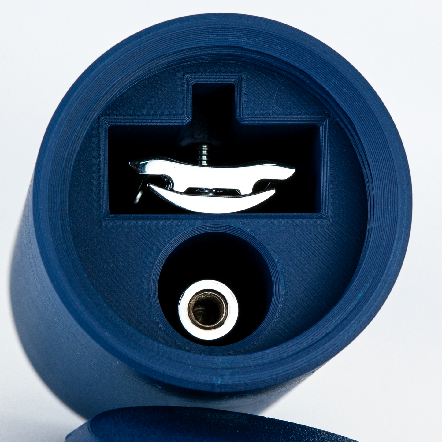 CLoseup of the navy blue suborbital capsule with a razor inside