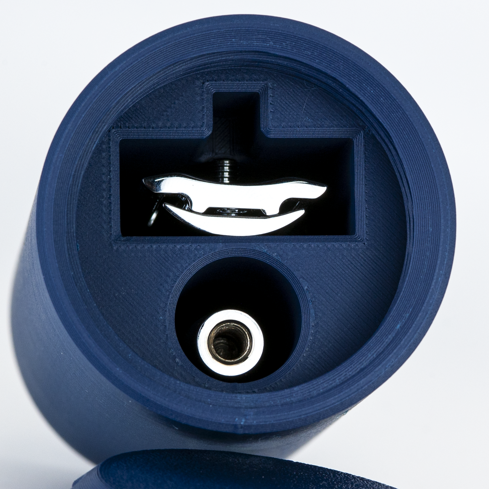 CLoseup of the navy blue suborbital capsule with a razor inside