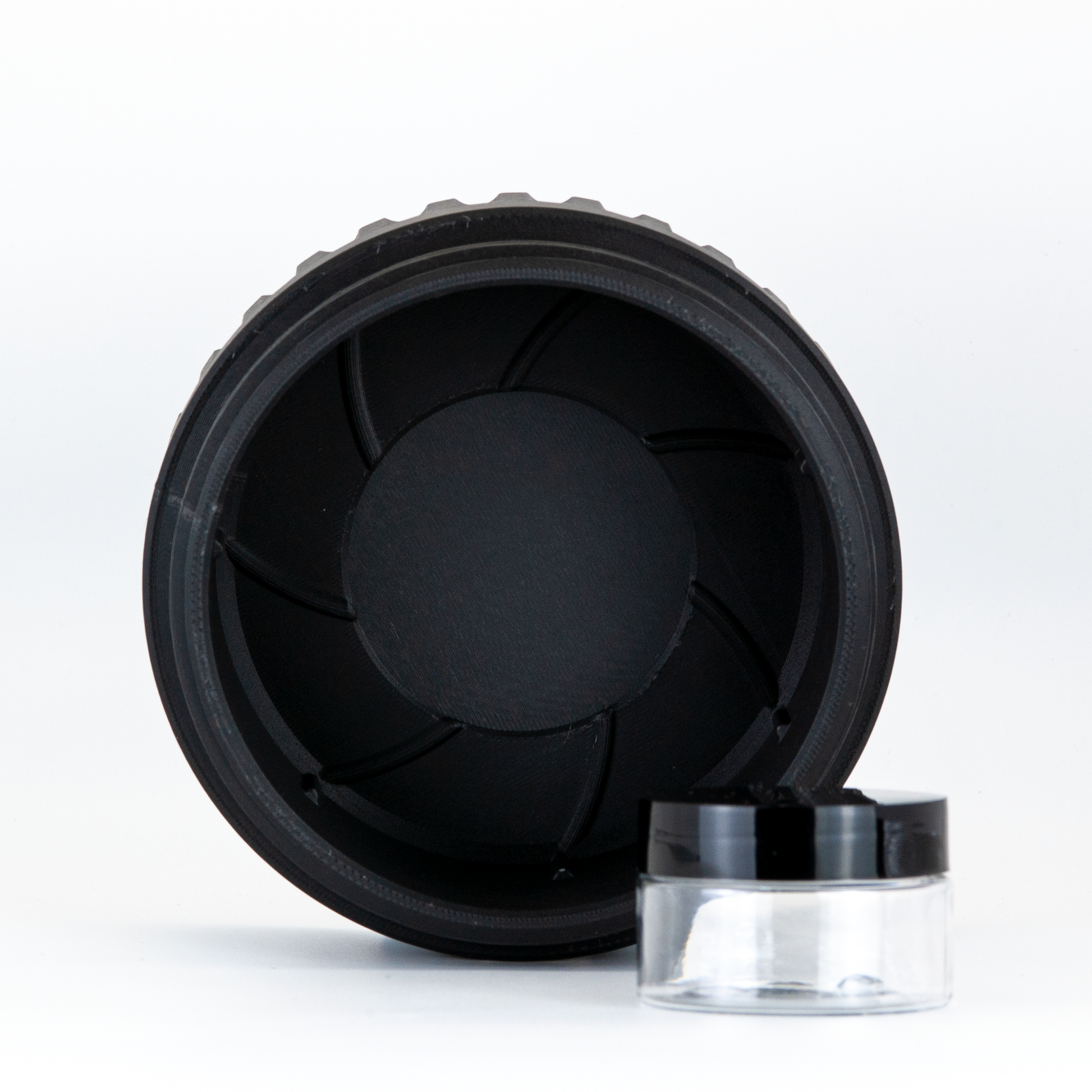 Black UFO Capsule Assembly process, shave soap installs first