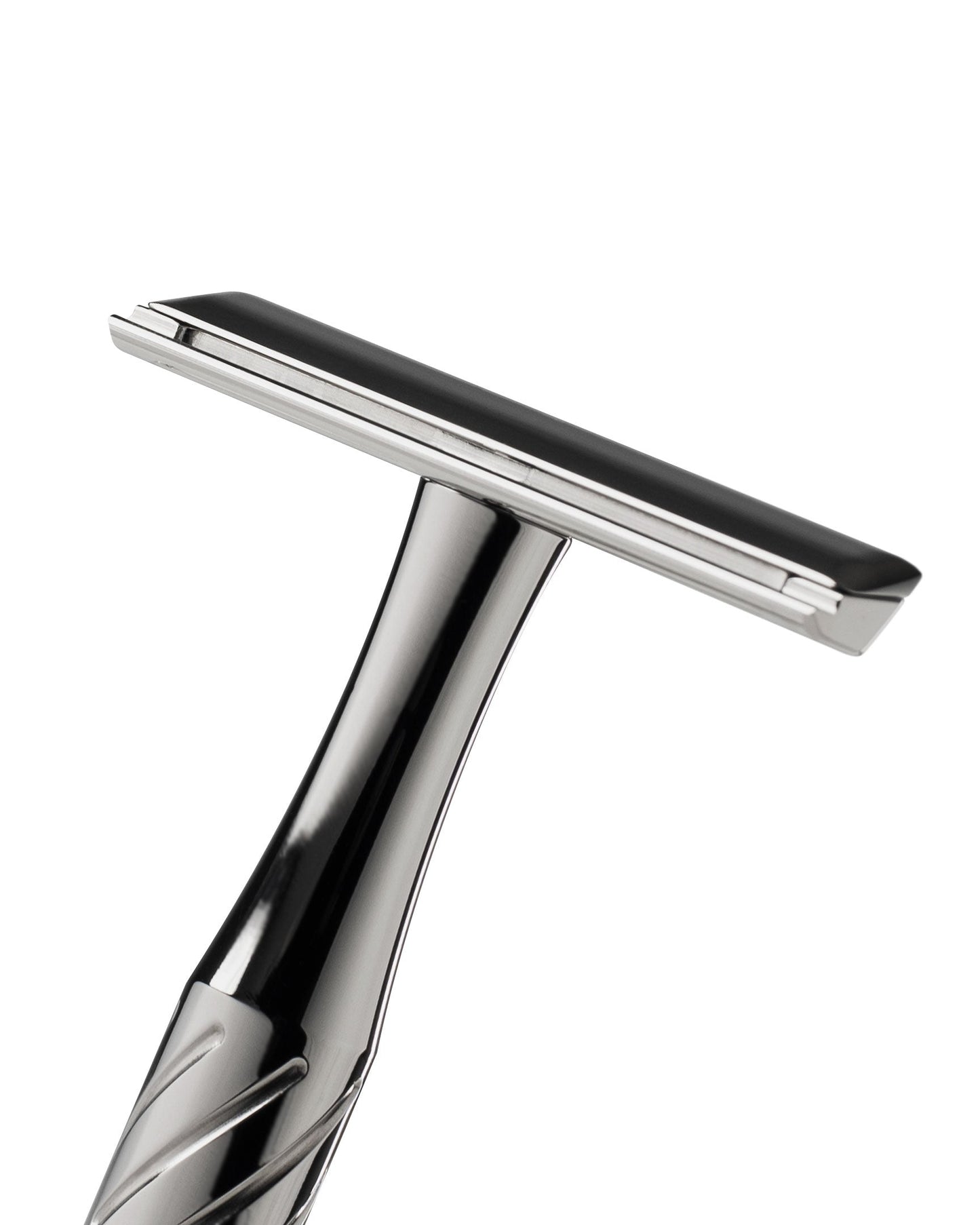 Polished silver titanium safety razor with black blade guard, close-up angled view showing T-shaped head and twisted handle