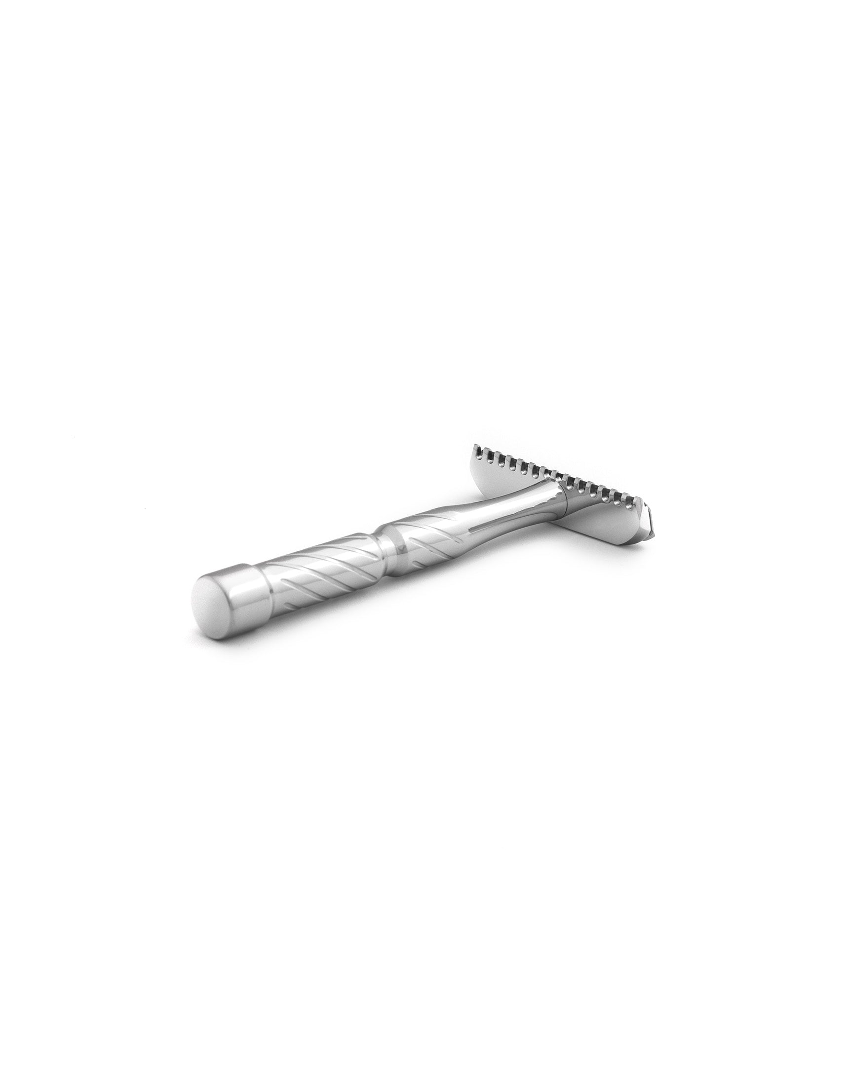 Stainless steel double-edge safety razor with spiral-textured handle and open-comb head, lying on white background