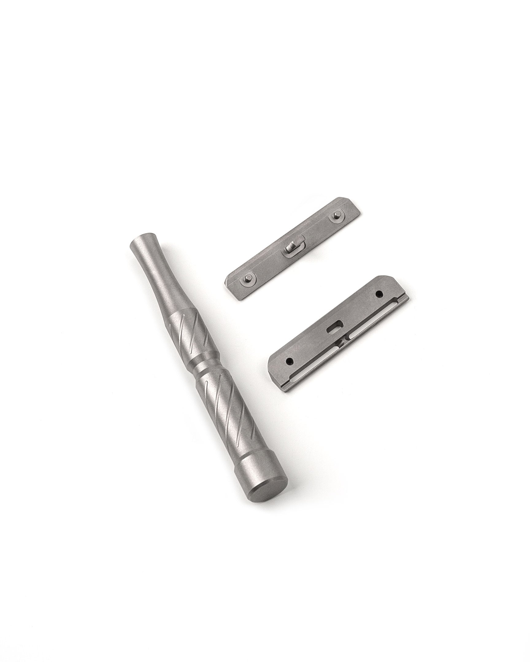 Disassembled Vector Titanium safety razor showing matte gray handle with spiral knurling pattern and two baseplate components