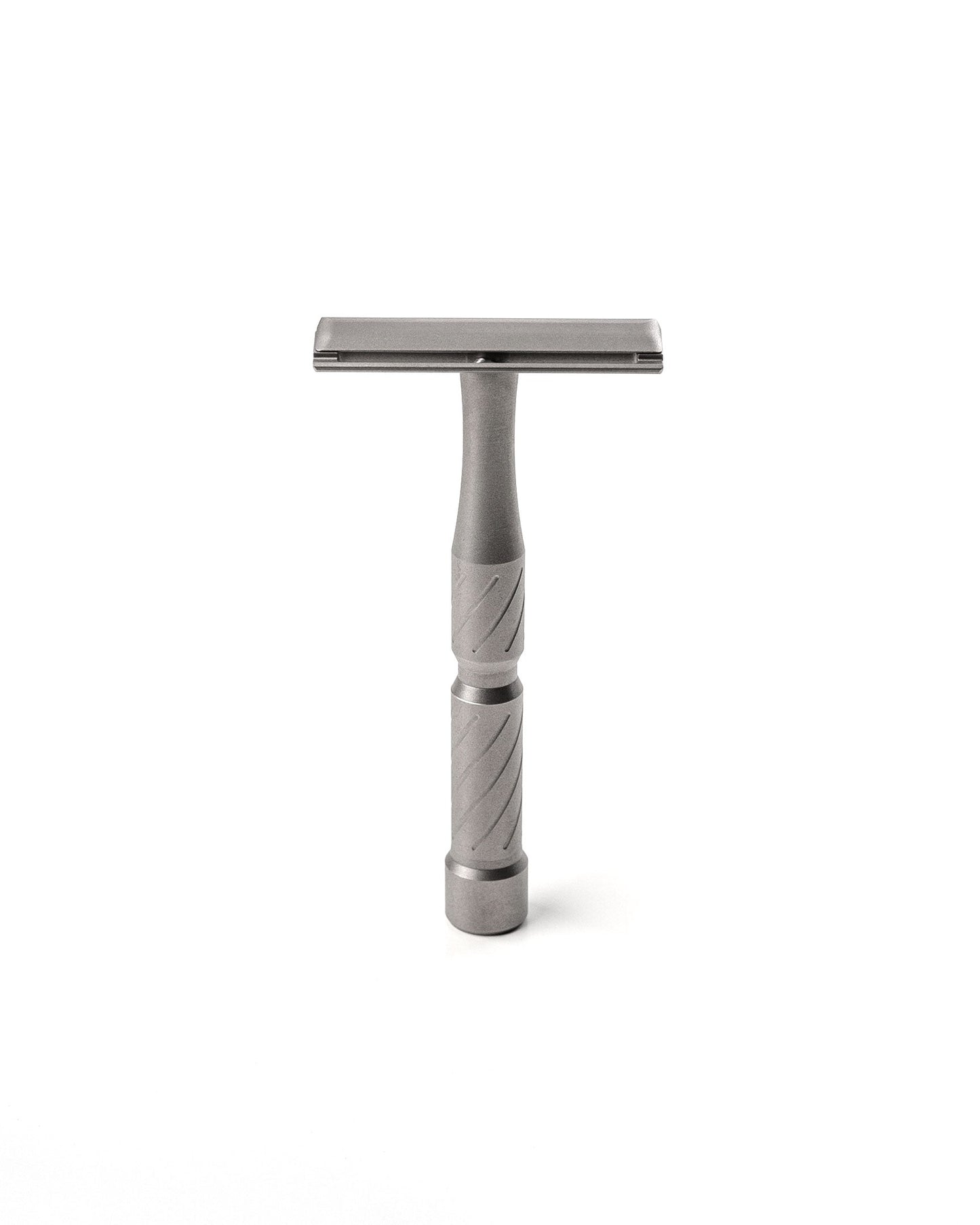 Vector Titanium double-edge safety razor with matte gray titanium finish and diagonal-grooved handle