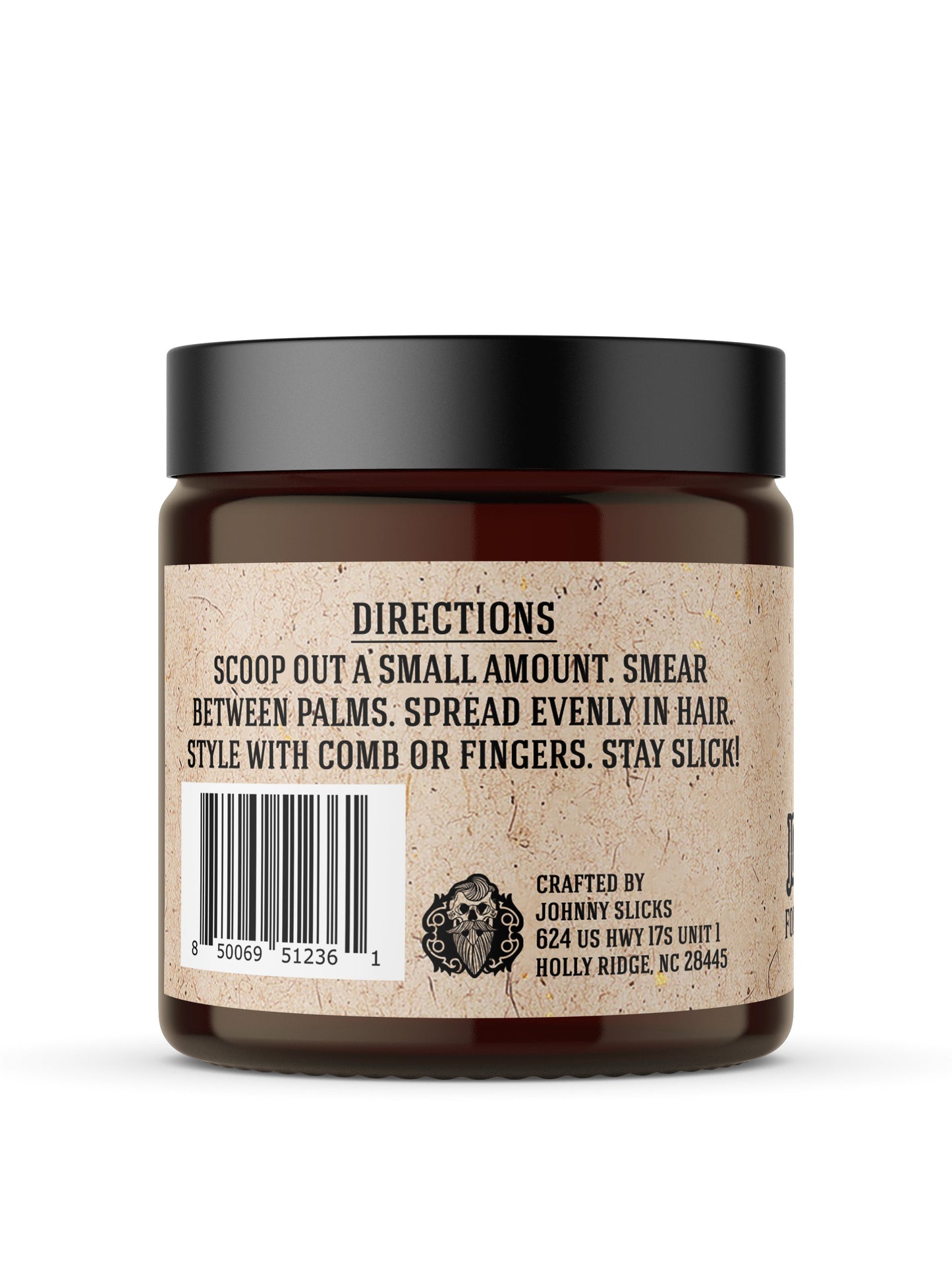Back of Johnny Slicks Formula 49 amber glass jar with black lid showing directions, barcode, and Holly Ridge NC address