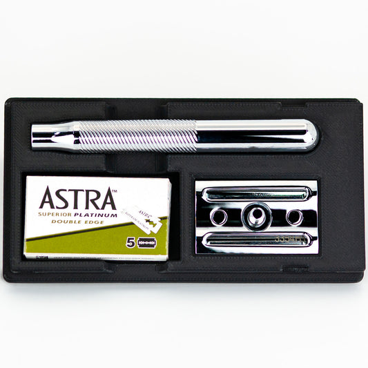 Open King C. Gillette safety razor travel case with chrome razor handle, box of Astra Superior Platinum blades, and chrome baseplate