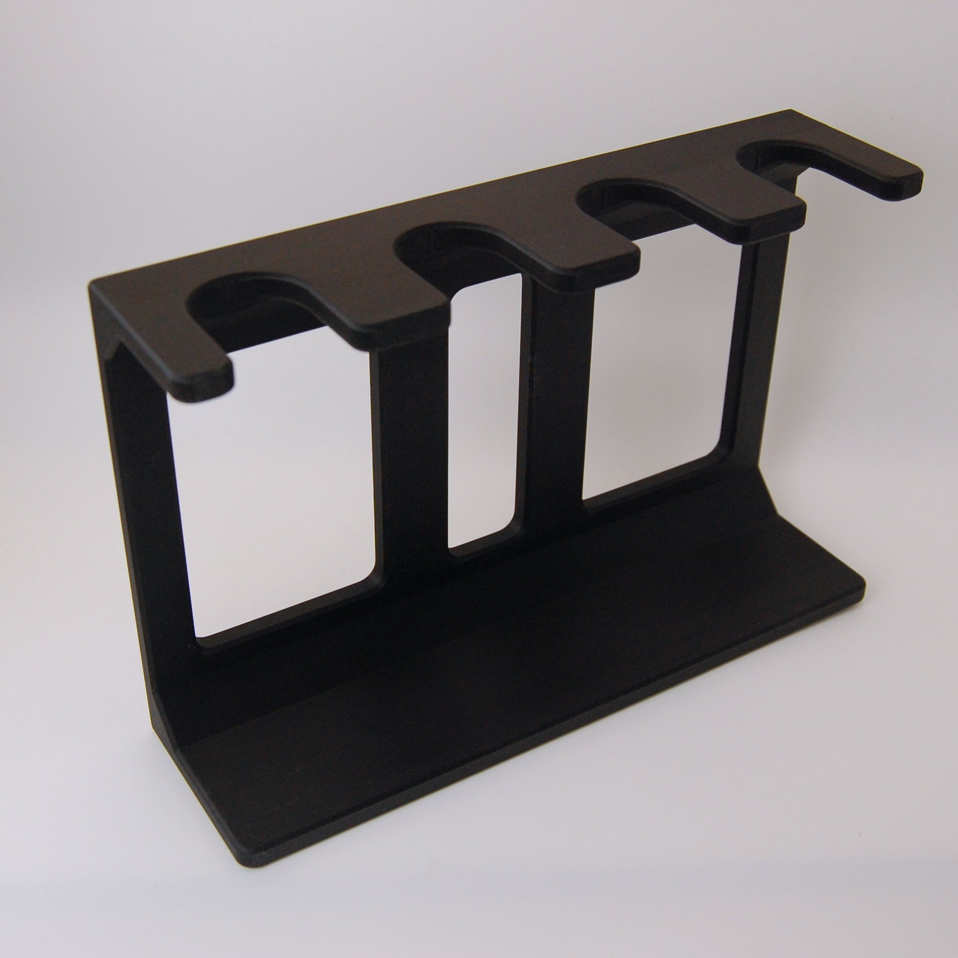 Black Shaving Brush stand on a black background.