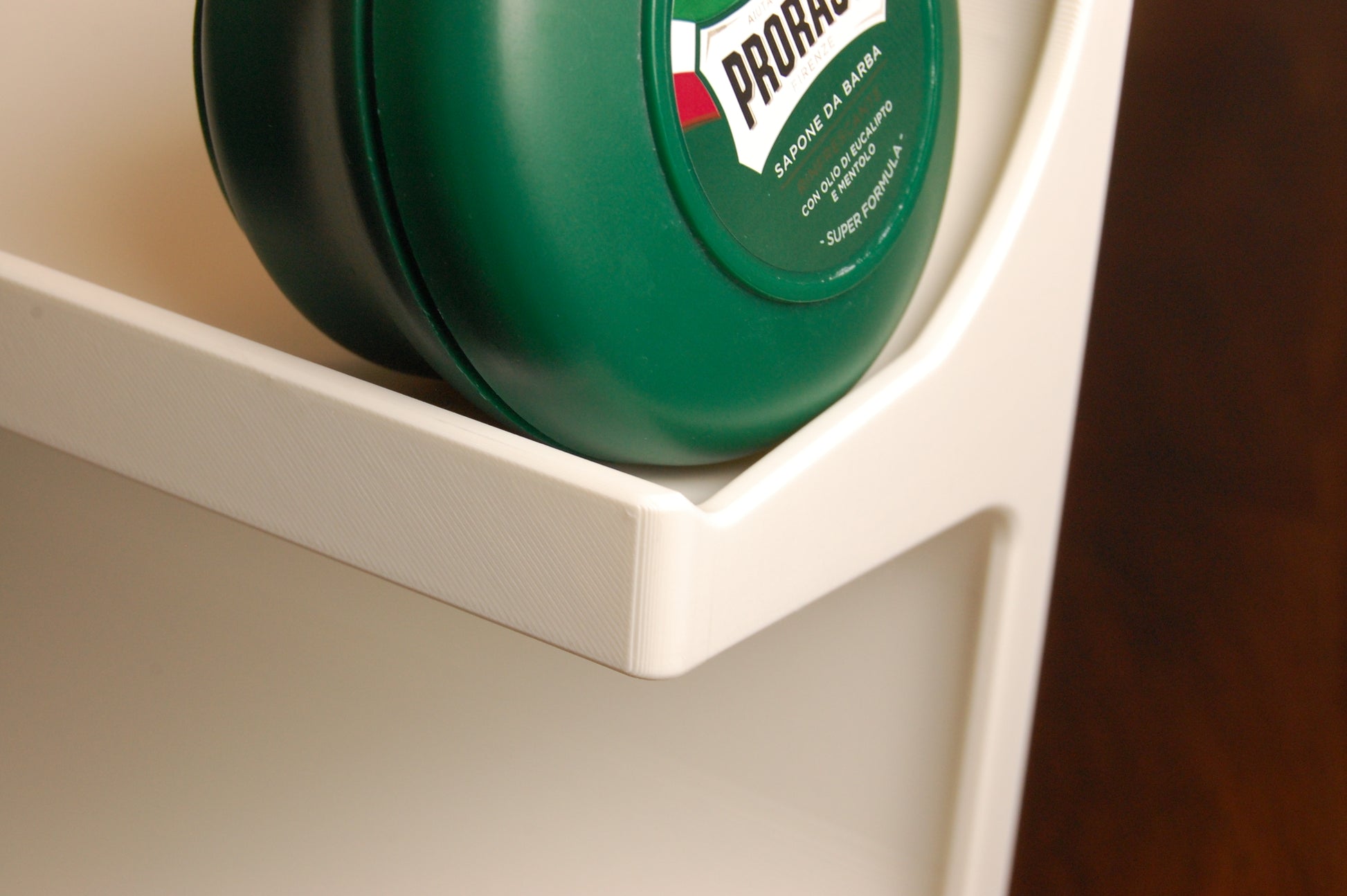 Close up of proraso soap on white shaving stand